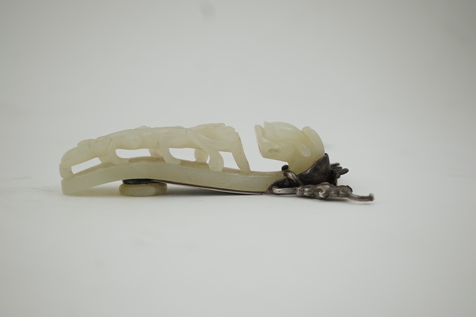 A Chinese jade and cabochon mounted hand mirror, the jade 18th/19th century